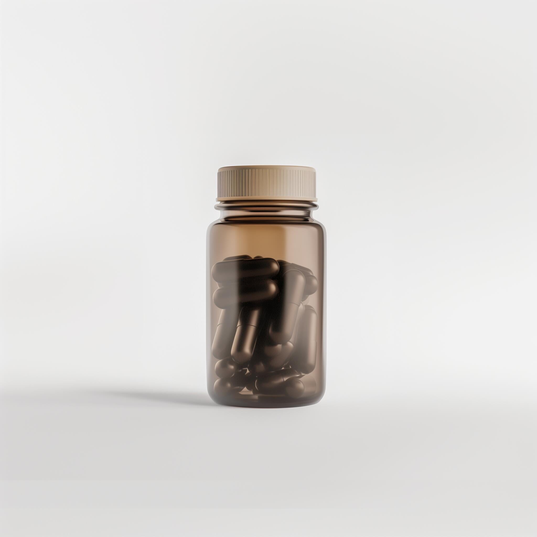 Brown plastic bottle of supplement capsules on white background